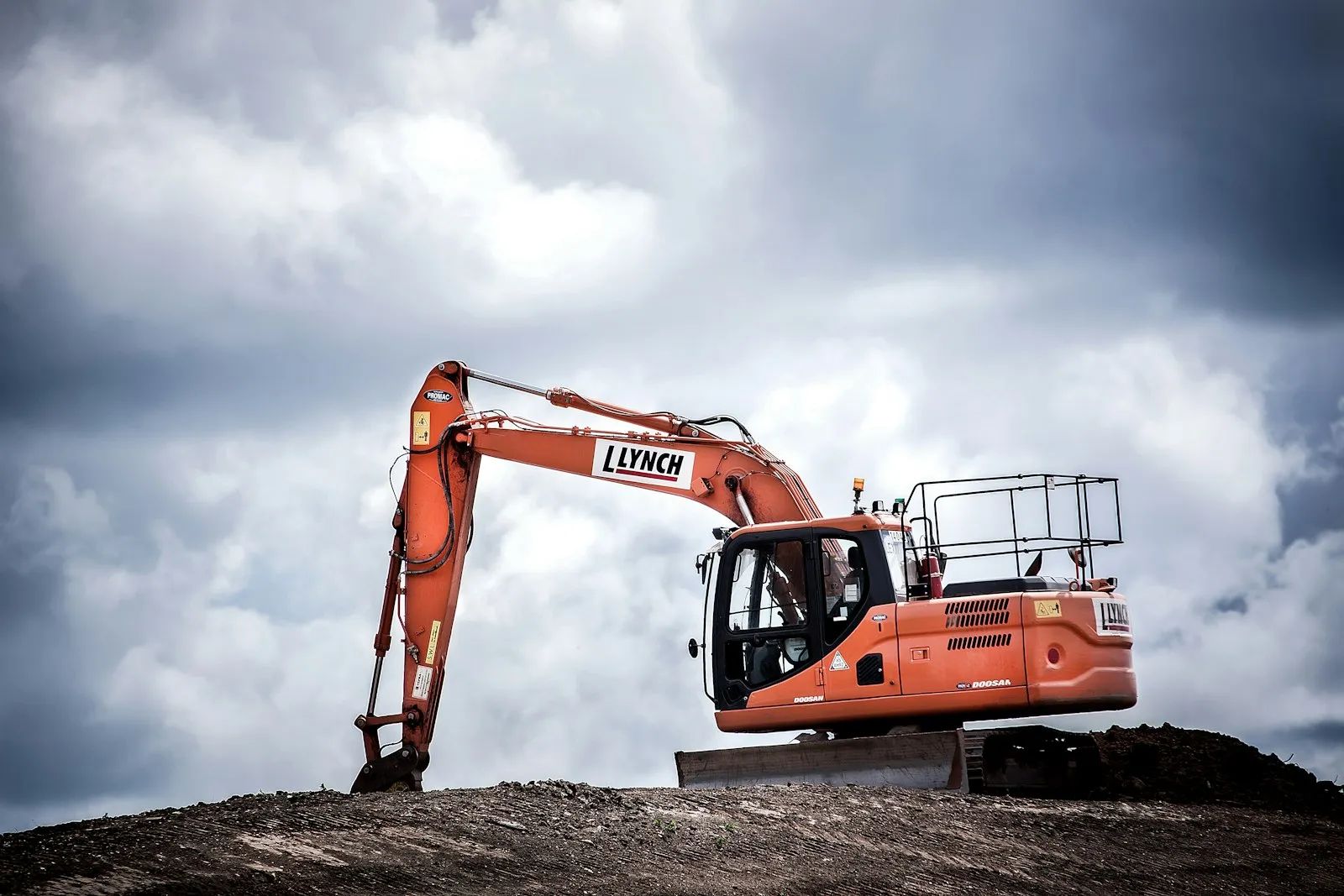 Orange excavator on a construction site
