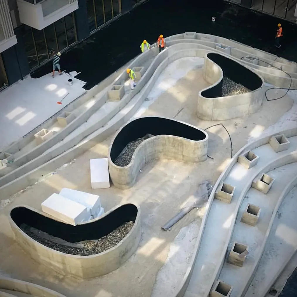 Aerial view of a terrace with organic shapes under construction